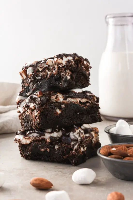 Three stacked Gluten-Free Rocky Road Brownies.