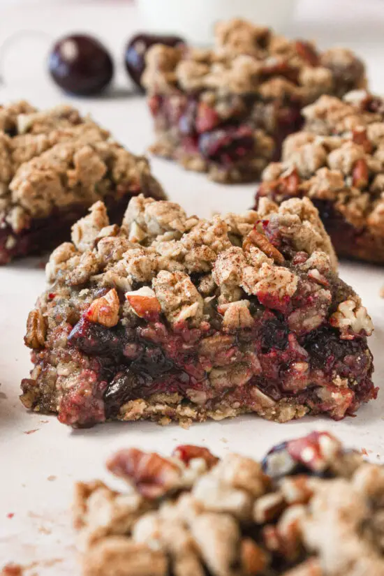 Up close picture of oatmeal cherry pie bars.