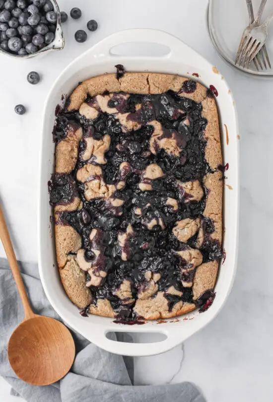 Baking dish filled with Blueberry Cobbler. 