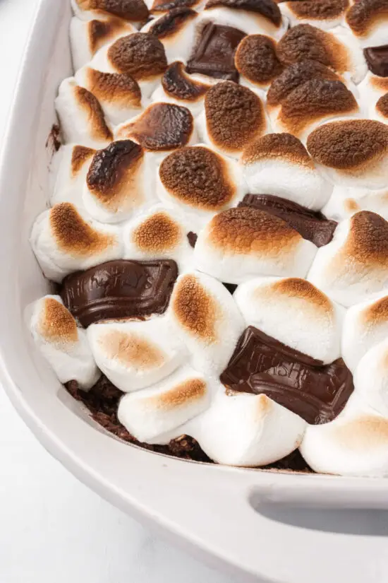Pan filled with warm gooey S'mores Cobbler and melted Hershey's chocolate bars. 